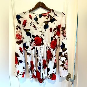 Floral Romper. Size Medium. Great condition.